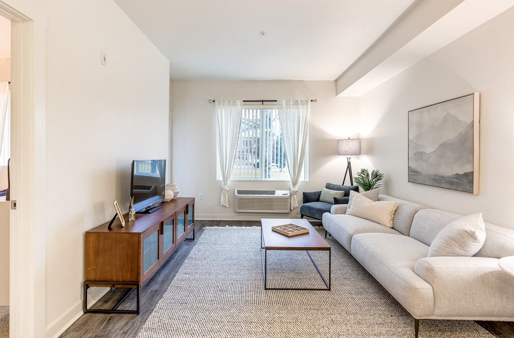 a living room with a couch and a coffee table