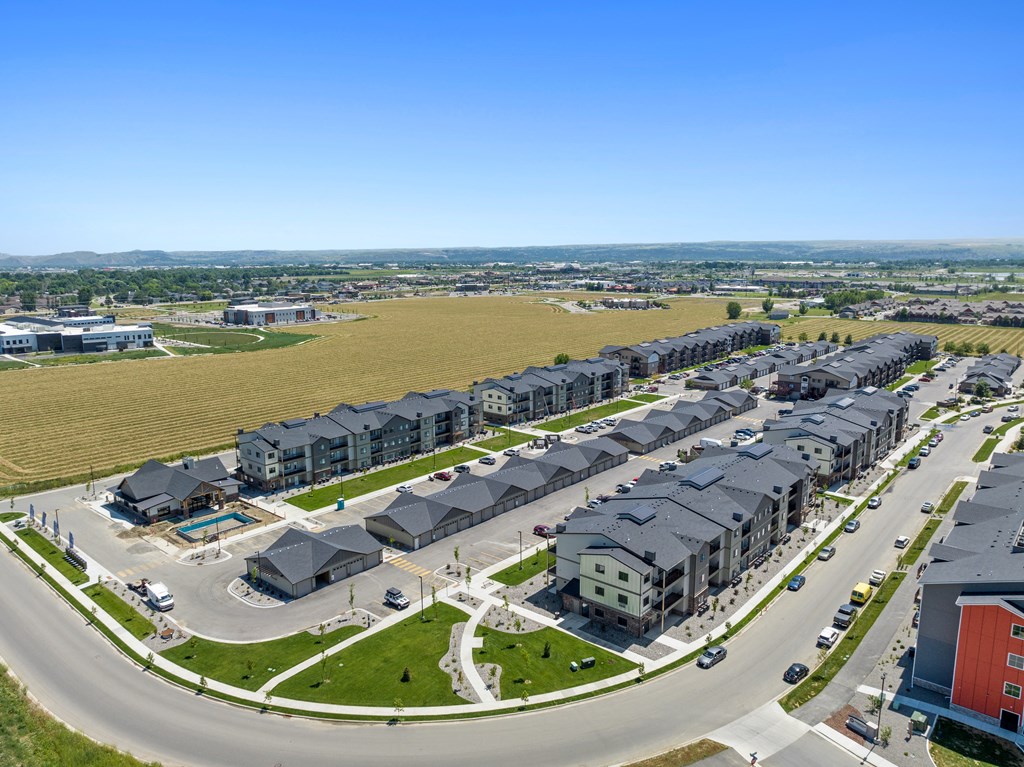 an aerial view of a group of houses in a suburb