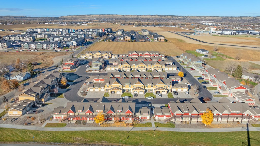 A large housing complex with a mix of detached and semi-detached houses.