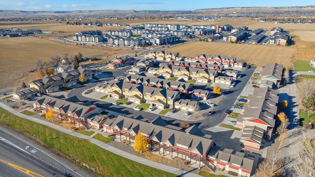 A large housing complex with a road running through it.