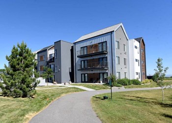 Lush Green Courtyard Wit Walking Paths Lush Green Courtyard Wit Walking Paths at West Village at Four Points, Montana, 59718 - Photo Gallery 4