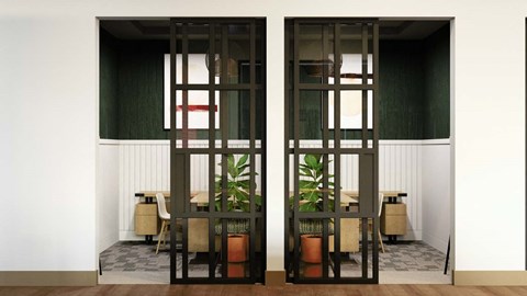 a room with a table and chairs in it