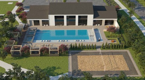 an aerial view of a house with a large swimming pool