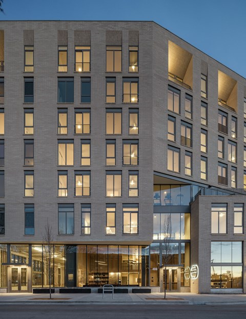 a rendering of the facade of a building with many windows