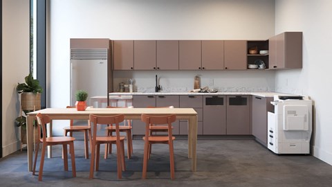 a kitchen with a table and chairs in front of a window