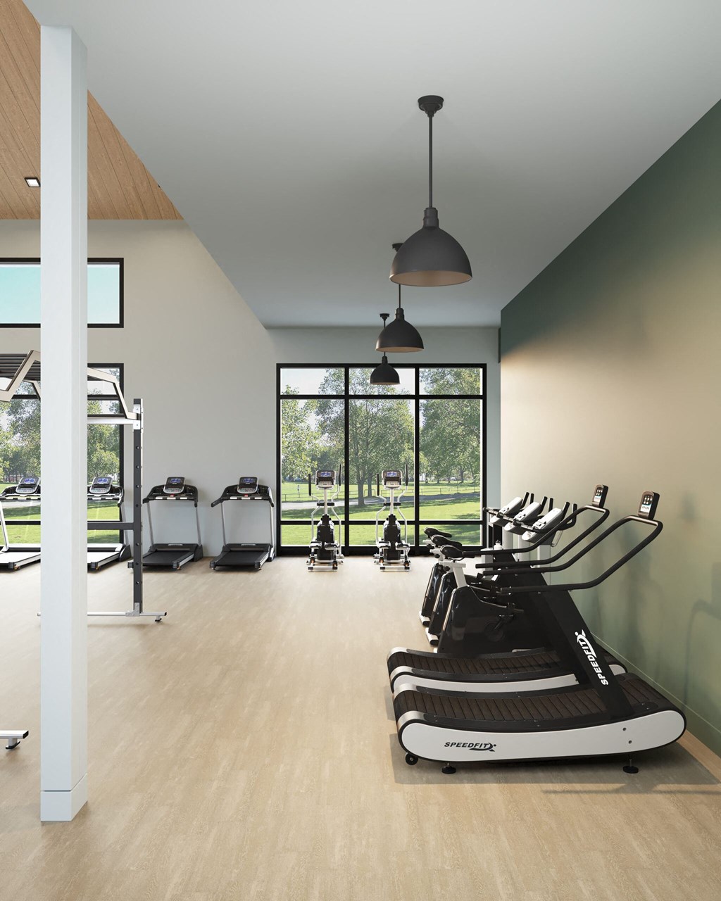a gym with treadmills and exercise machines