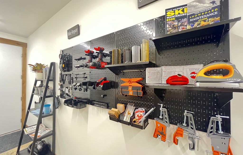 A wall of LEGO pieces and tools for building and maintenance. A wall of LEGO pieces and tools for building and maintenance at Silverbrook Apartments Apartments, Ridgeland, Kalispell