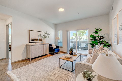 Living Room With Balcony View at Jasper Apartments, Meridian, ID