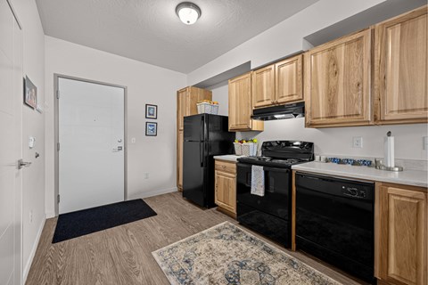 A kitchen with black appliances at Majestic Drive, Missoula, MT 59808