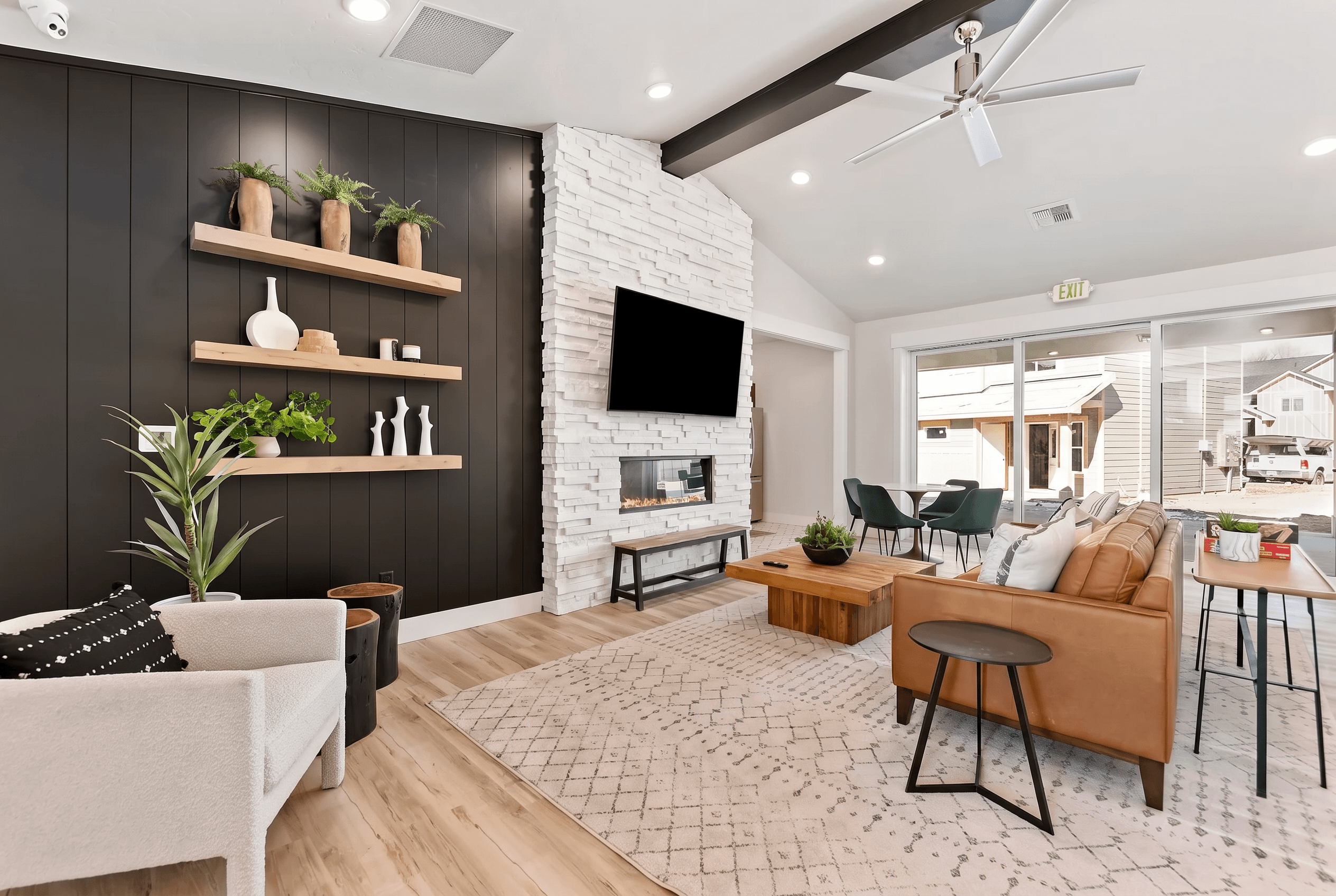 A living room with a fireplace and a couch.