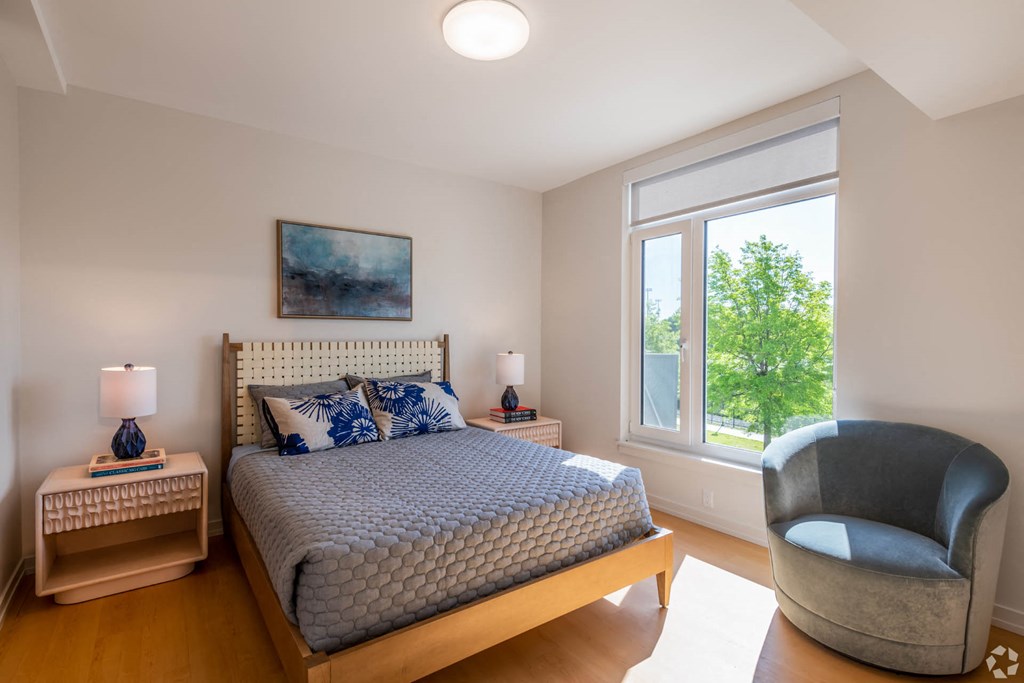 Bedroom With Expansive Windows at Park77 Apartments, Cambridge, Massachusetts