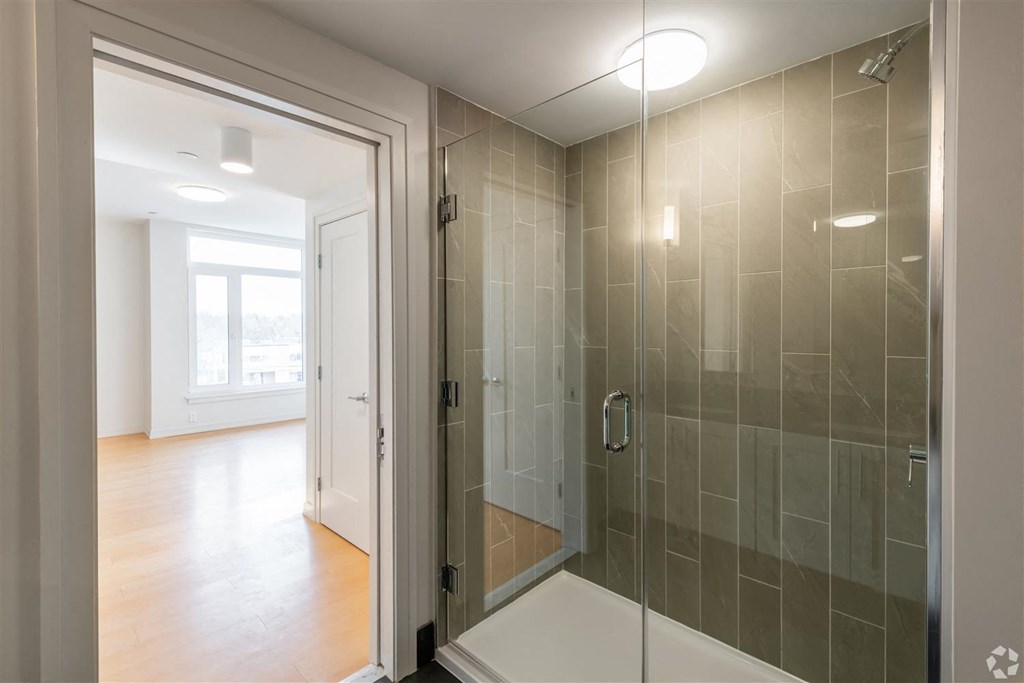 Glass-Enclosed Showers at Park77 Apartments, Cambridge