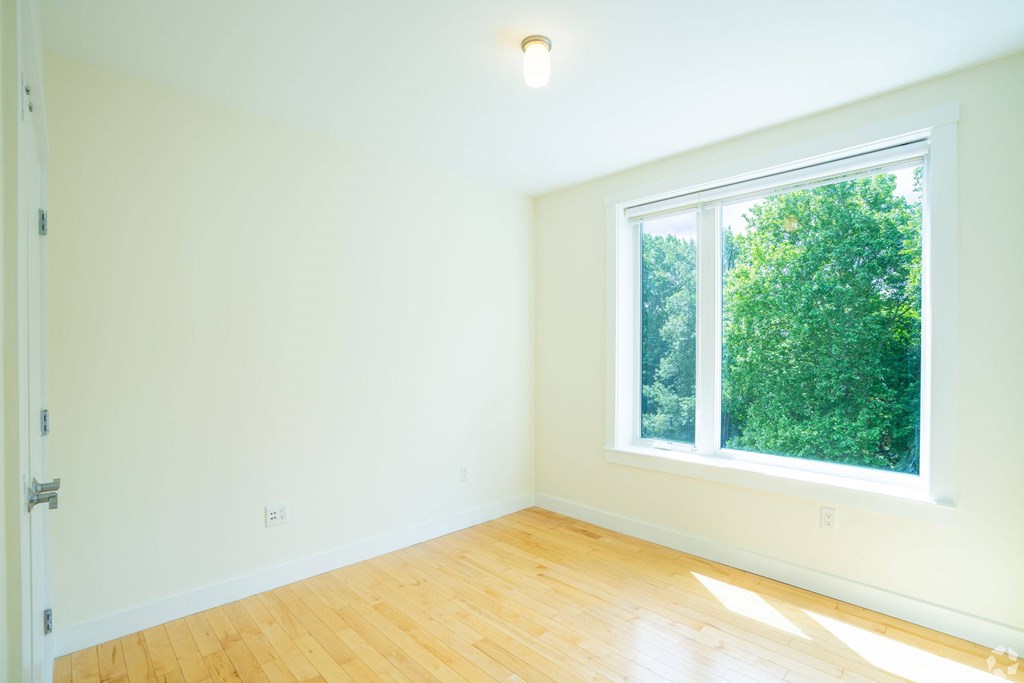 A room with a window and wooden flooring at 603 Concord Apartments, Cambridge, MA, 02138