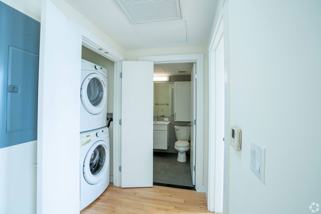 A laundry room with a washer and dryer in it. at 603 Concord Apartments, Massachusetts, 02138