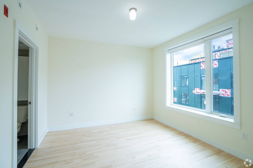 A room with a window overlooking a cityscape. at 603 Concord Apartments, Cambridge, MA, 02138