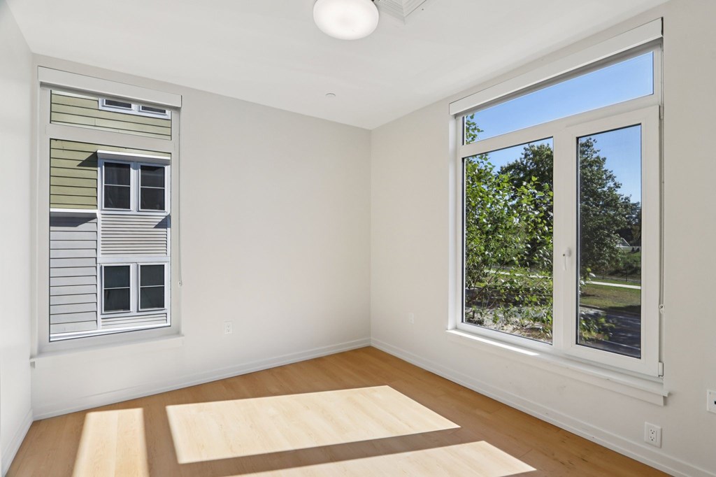 Bedroom with Oversized windows at Park77 Apartments, Cambridge, Massachusetts, 02138
