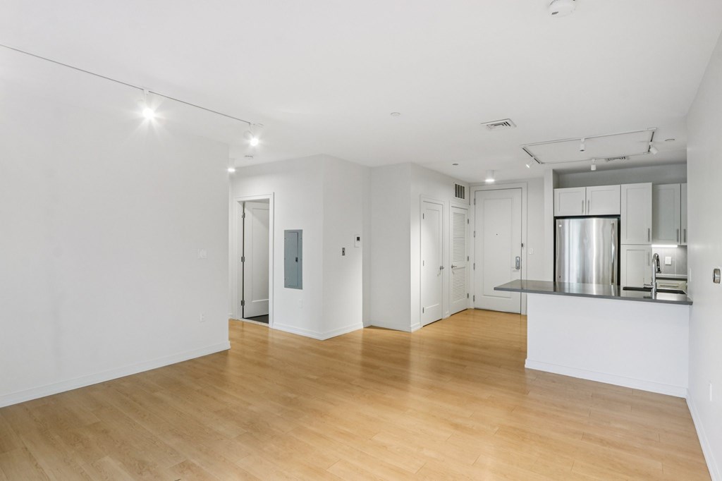 Vacant room with wooden floor at Park77 Apartments, Cambridge, 02138