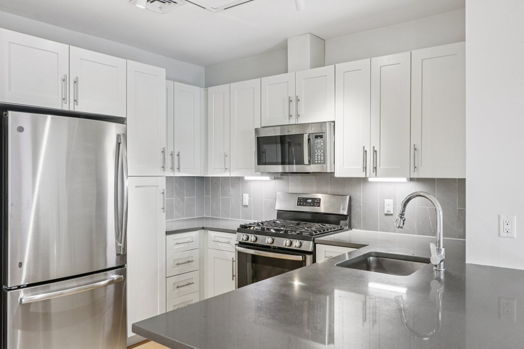 Kitchen with granite countertop at Park77 Apartments, Cambridge, Massachusetts