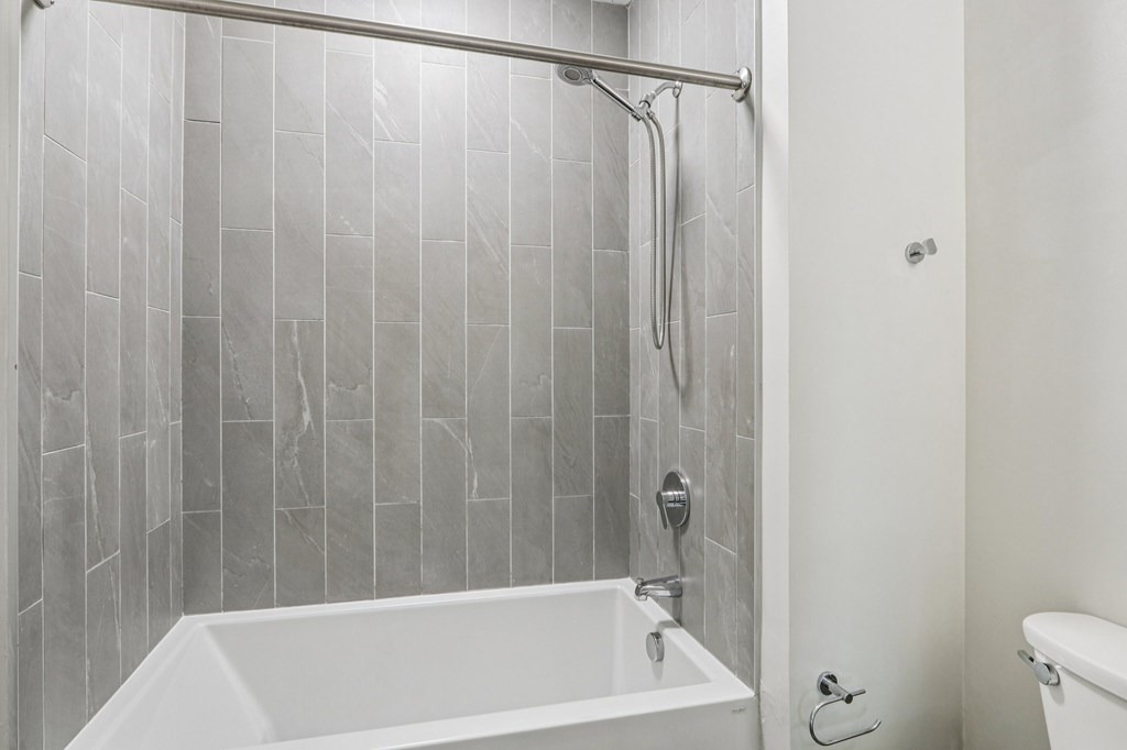 Bathroom with white bathtub at Park77 Apartments, Cambridge, MA, 02138