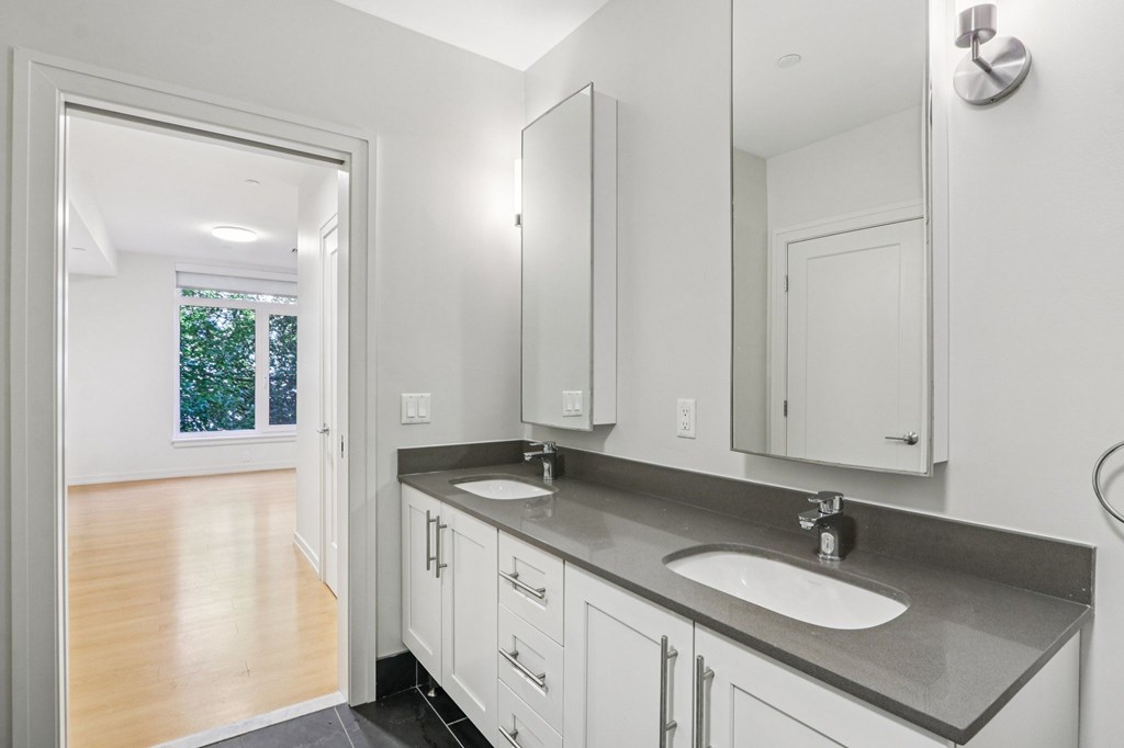 Bathroom with granite countertops at Park77 Apartments, Massachusetts