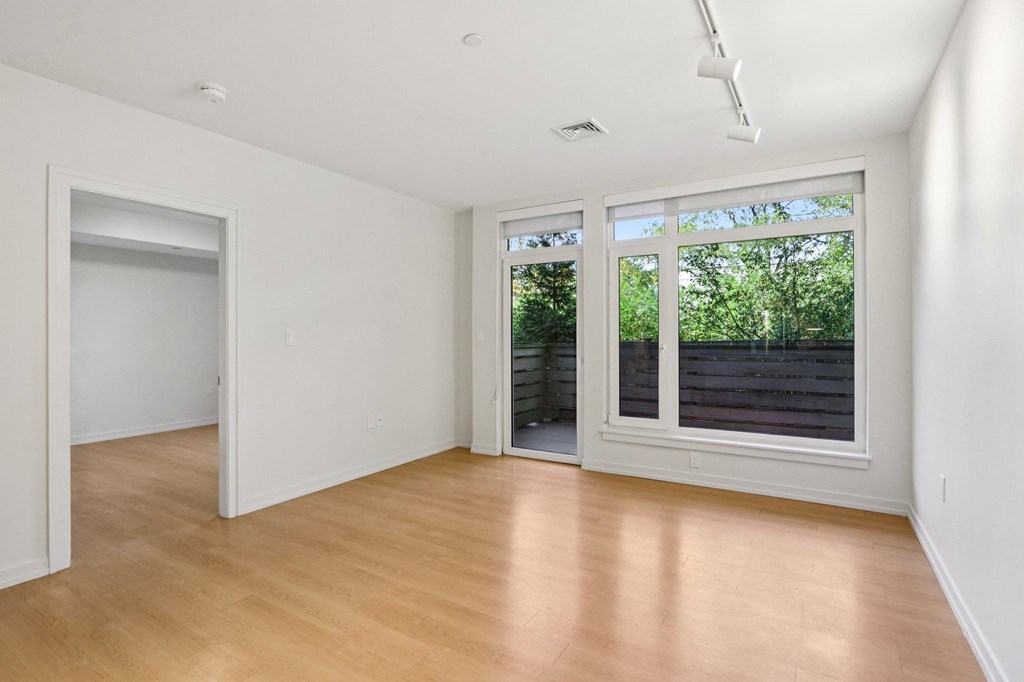 Living room with attached patio at Park77 Apartments, Cambridge, Massachusetts, 02138