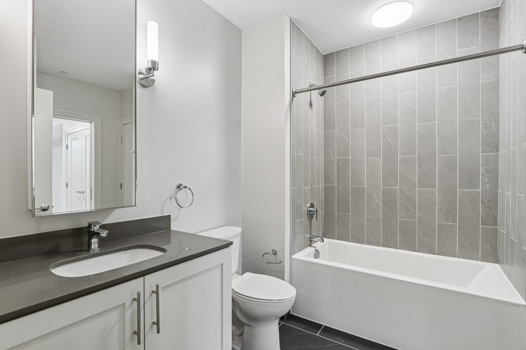 Bathroom with bathtub and toilet at Park77 Apartments, Massachusetts, 02138
