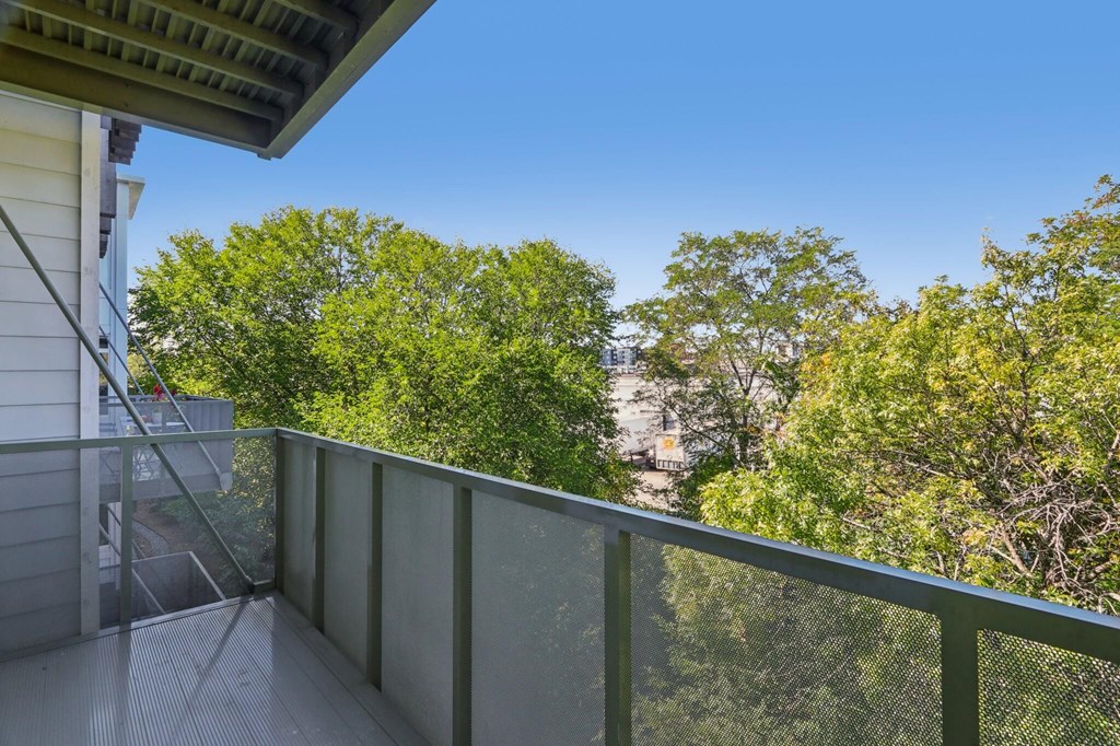 Patio with railings at Park77 Apartments, Cambridge