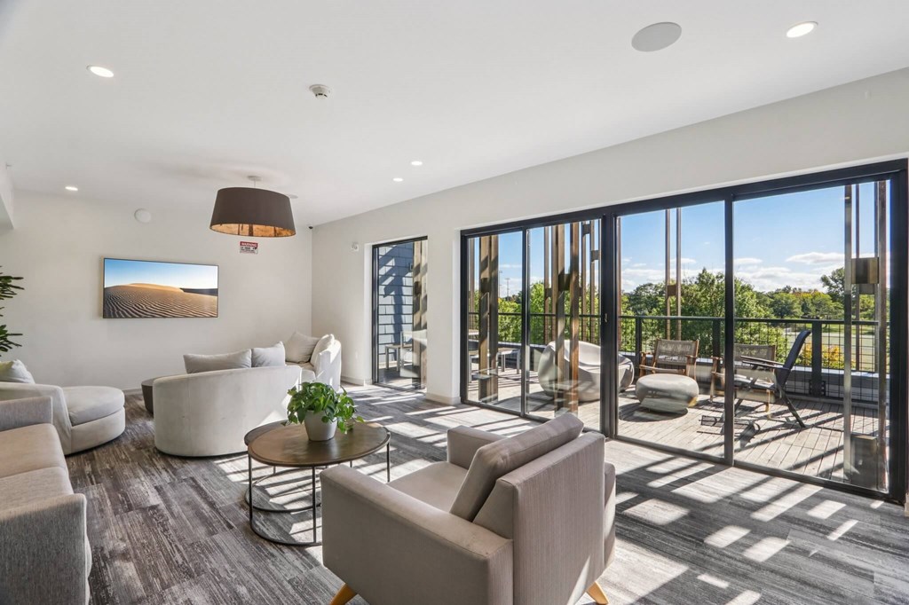 Gorgeous living room with attached patio at Park77 Apartments, Cambridge, Massachusetts, 02138