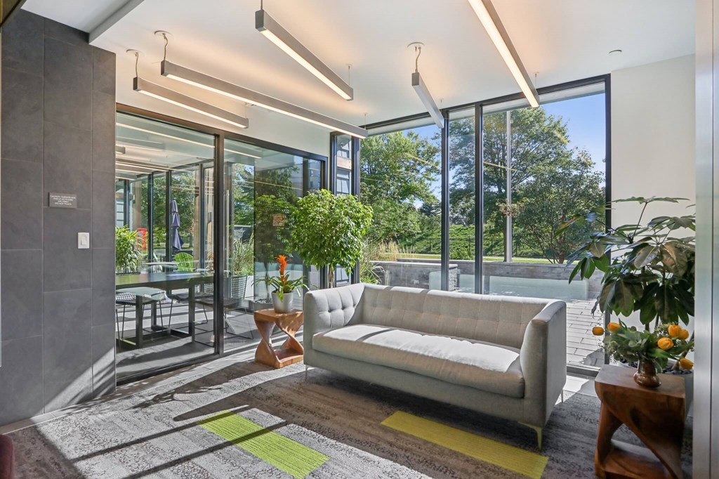 Modern living room with a couch at Park77 Apartments, Cambridge