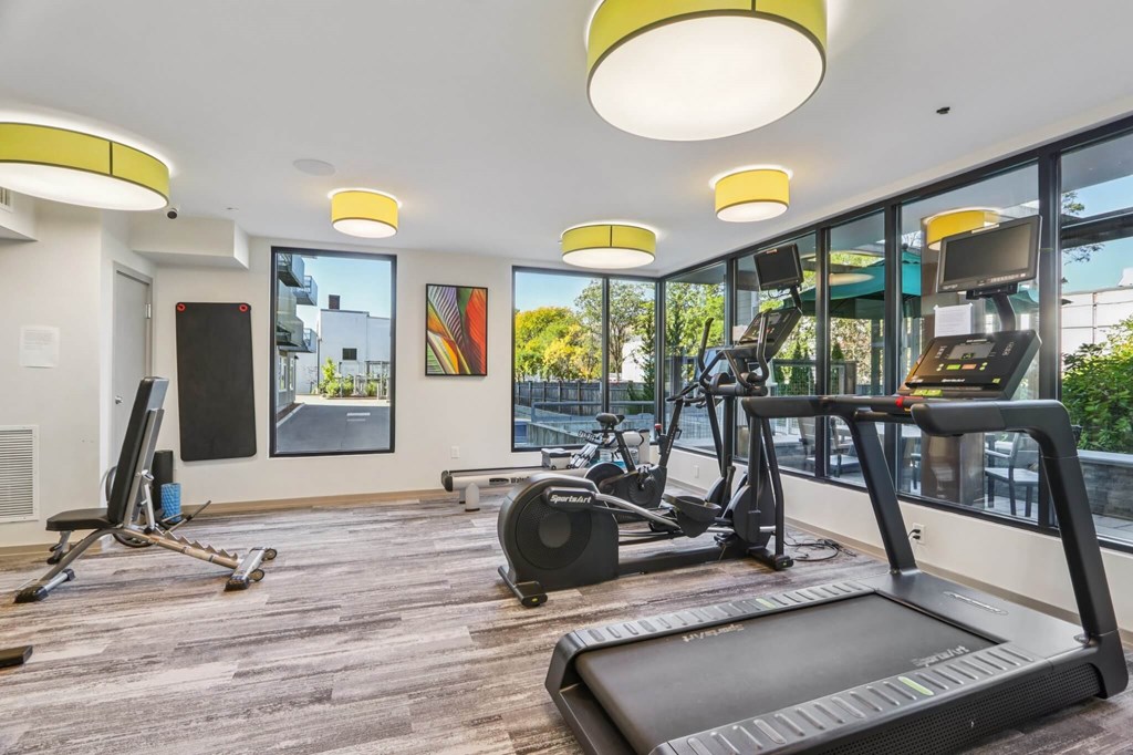 Spacious gym with treadmills at Park77 Apartments, Cambridge