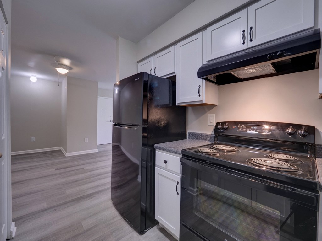 Kitchen with White Cabinets at Highland Club Apartments, Watervliet, NY 12189