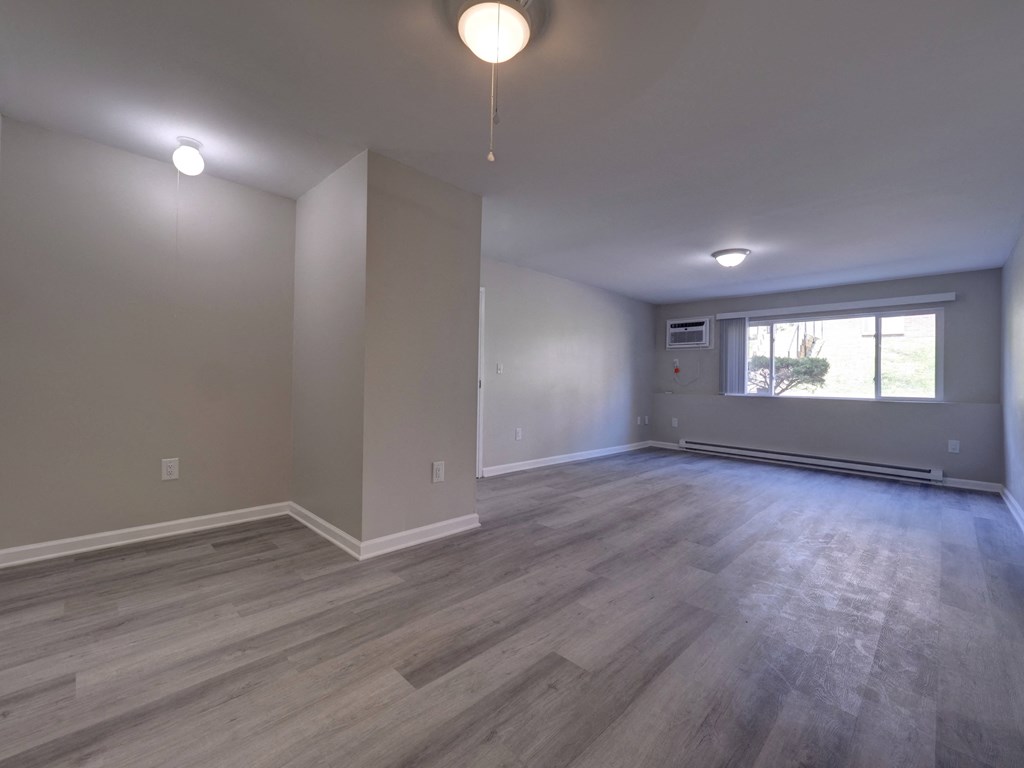 Empty Living Room at Highland Club Apartments, Watervliet, NY 12189