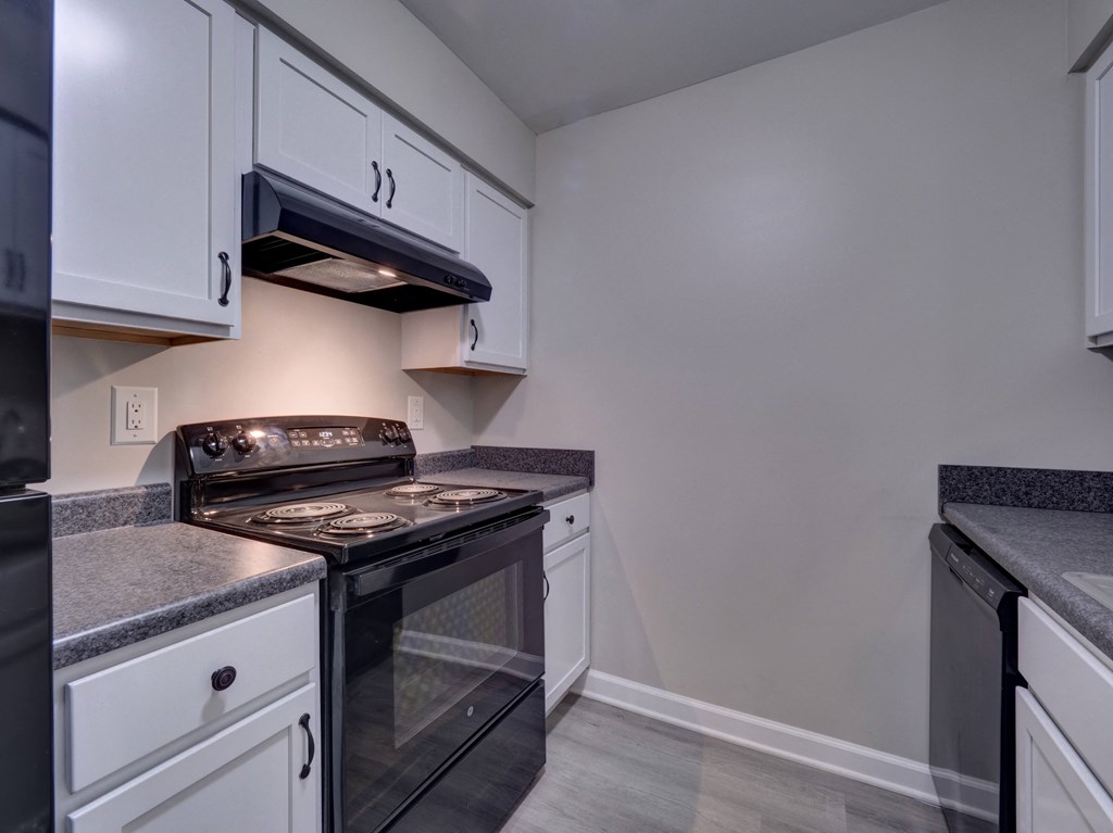 Kitchen with White Cabinets at Highland Club Apartments, Watervliet, NY 12189