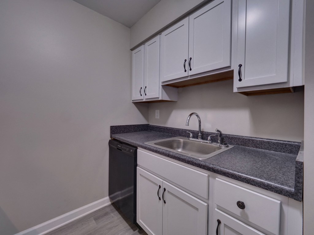Kitchen with White Cabinets at Highland Club Apartments, Watervliet, NY 12189