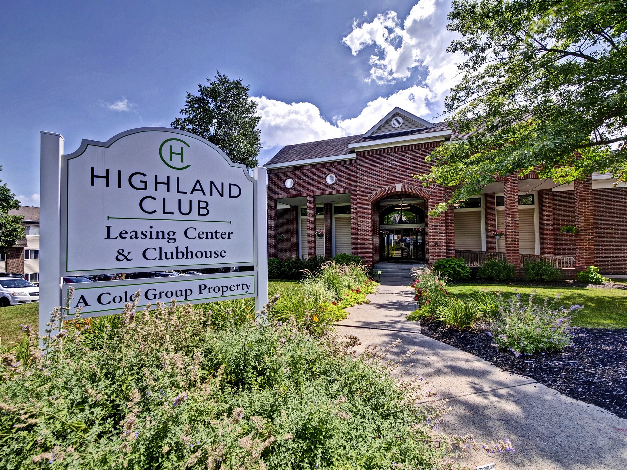 Welcoming Property Signage at Highland Club Apartments, Watervliet, New York 12189