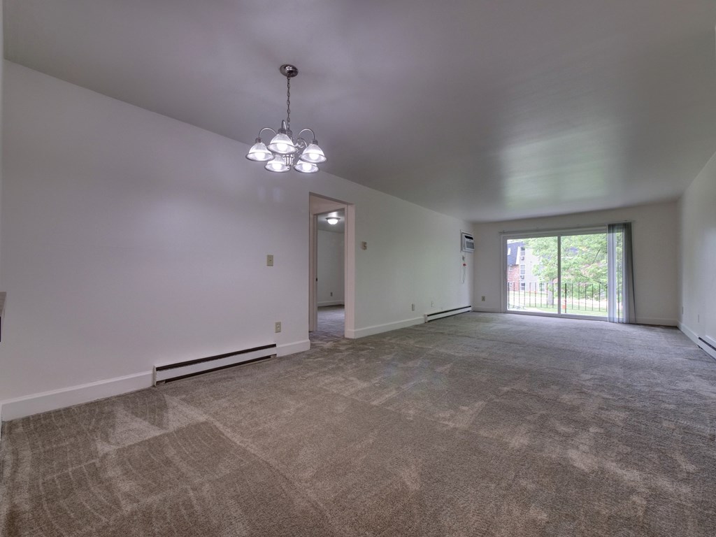 Living Room With Private Balcony at Cedar Park Apartments, Troy