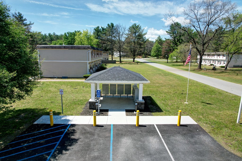 a gazebo in the middle of a parking lot