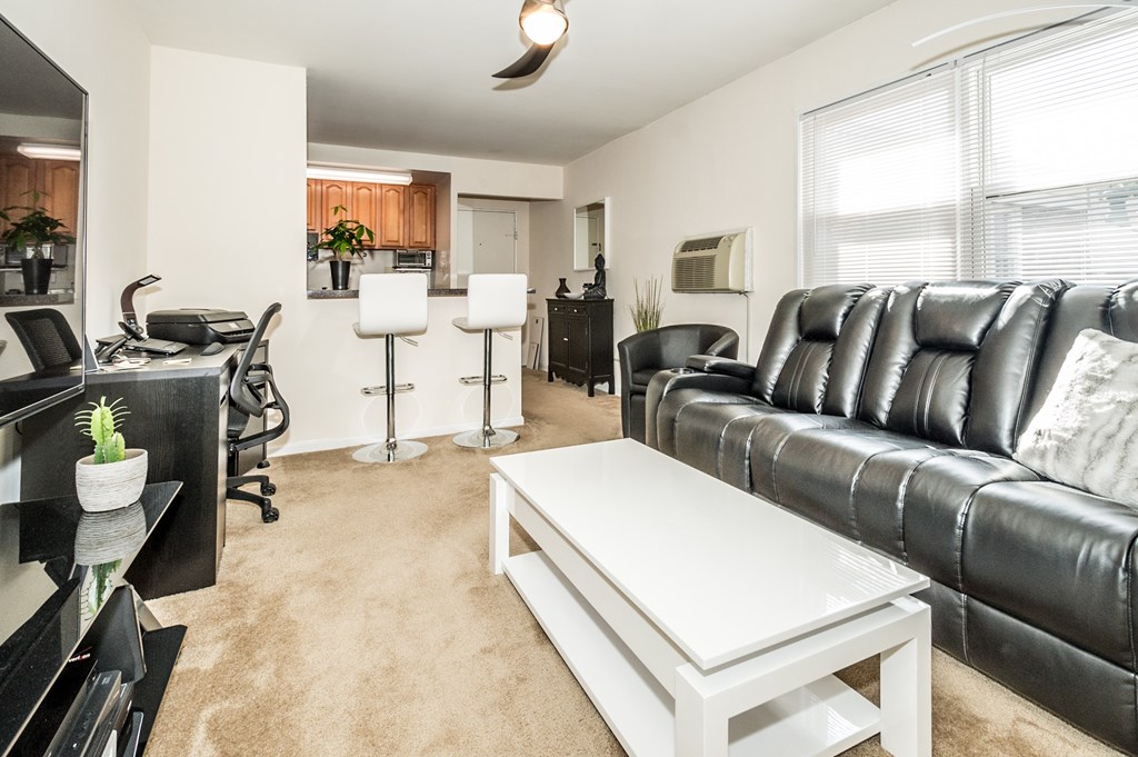 Living Room With Kitchen View at Garwood Gardens Apartments, Garwood, NJ 07027