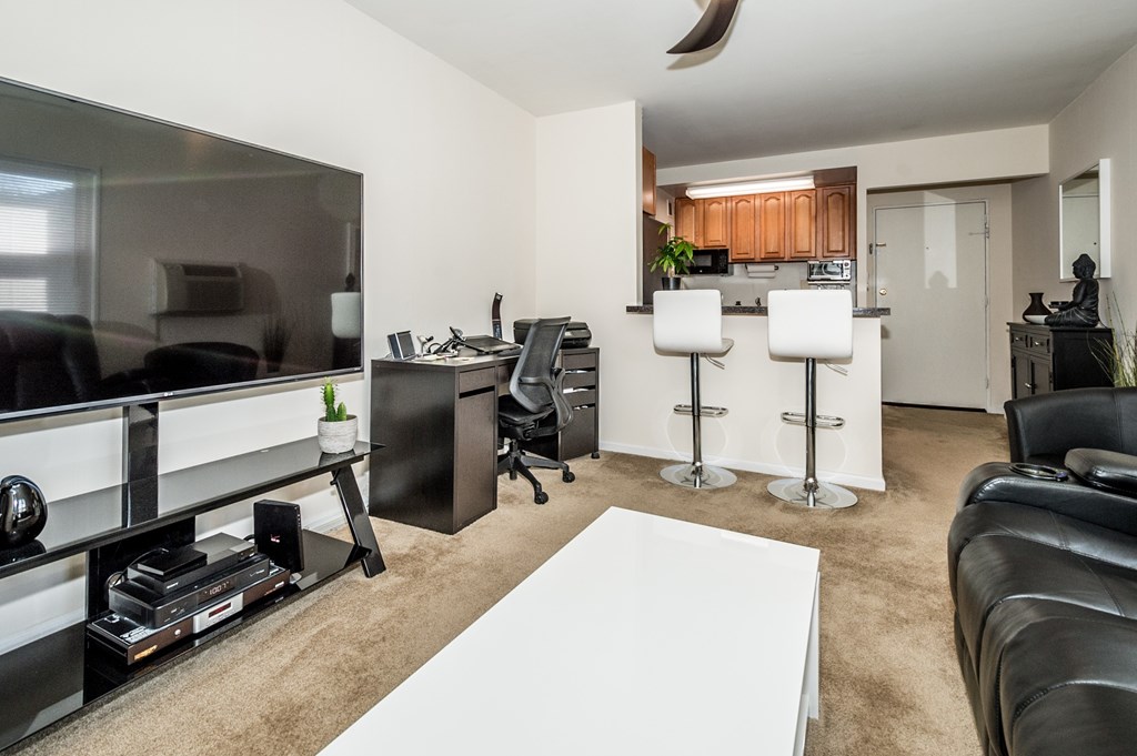 Living Room With TV at Garwood Gardens Apartments, Garwood