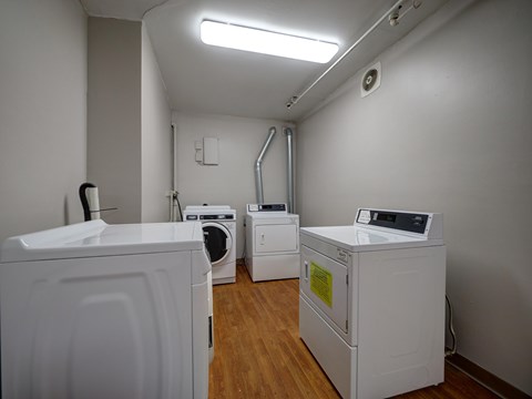 A laundry room with a washer and dryer.