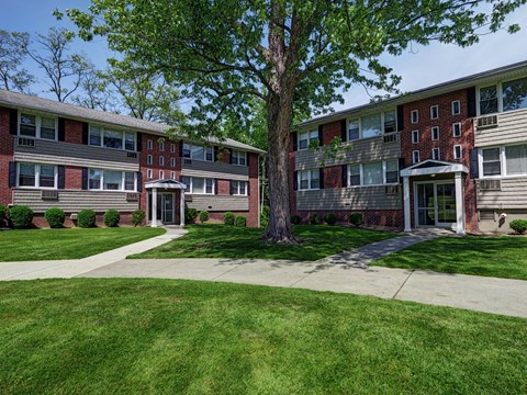 our apartments at the district feature a spacious yard and green grass