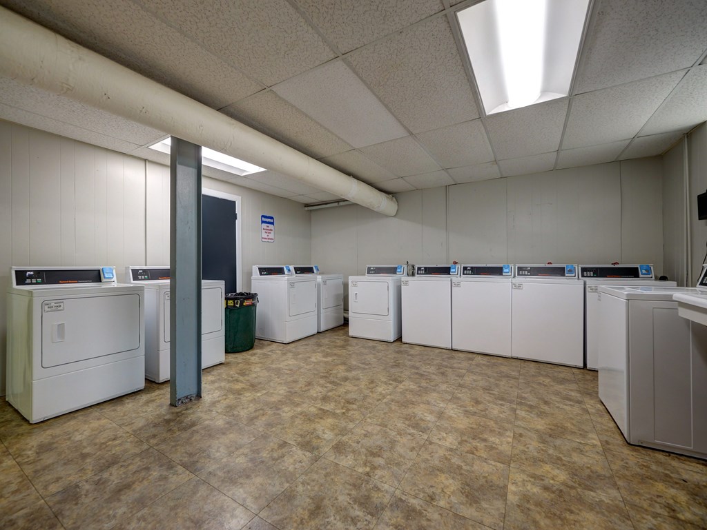 A laundry room with washers and dryers. at Willett Apartments, Albany, NY, 12210