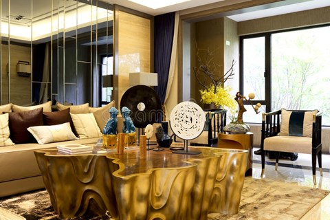 a luxurious living room in a condominium with a dining table and a couch and