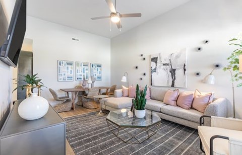 a living room with a couch and a table