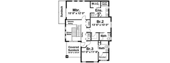 A floor plan of a home with a master bedroom, two bathrooms, and a covered sun deck.