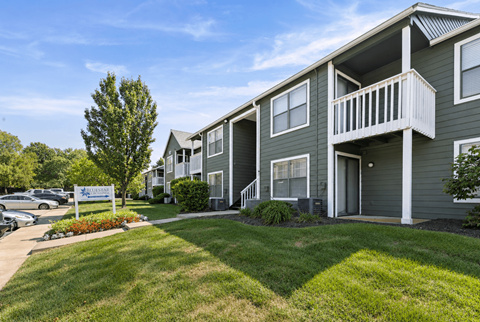 A sunny day at a well-kept apartment complex.