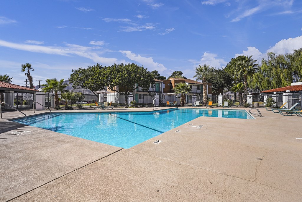 the swimming pool at the enclave apartments
