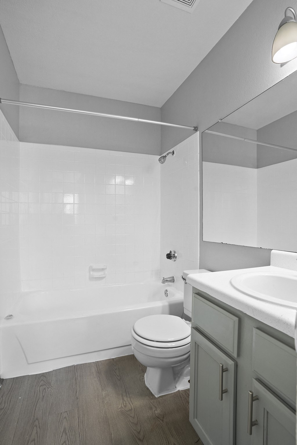 an empty bathroom with a toilet and a sink