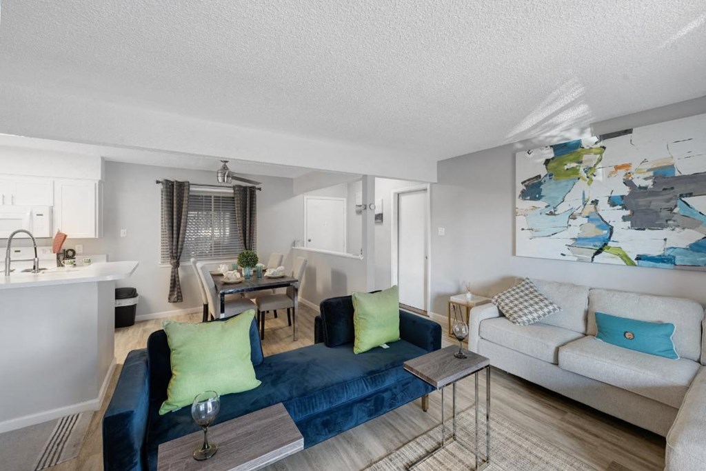 a living room with a couch and a table