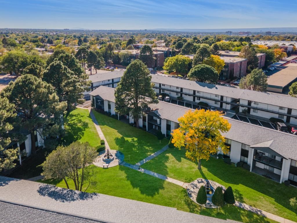 an aerial view of a campus with trees and buildings